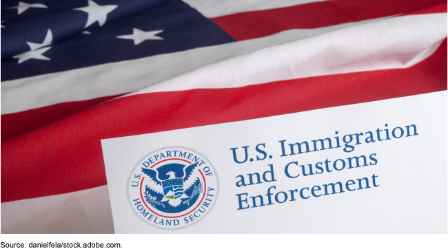 Illustration showing an American flag and a piece of paper with the U.S. Immigration and Customs Enforcement (ICE) logo and name on it.
