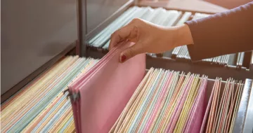 A file cabinet with files.